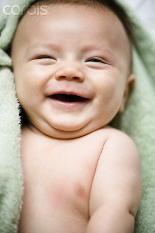 baby laughing at 1 month